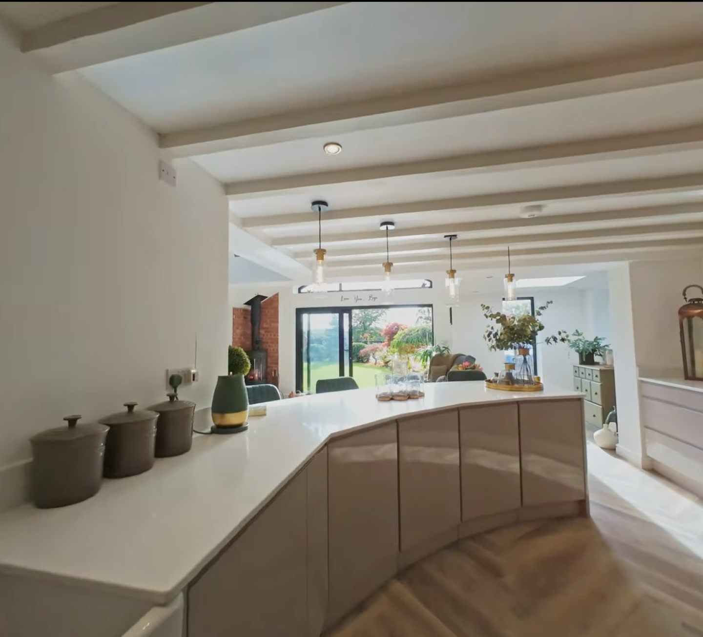 Finished kitchen-diner with a curved island